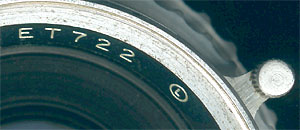 Kodak code "ET", indicating the year (19)49, on a Kodak f/2.8 80 mm Ektar lens.